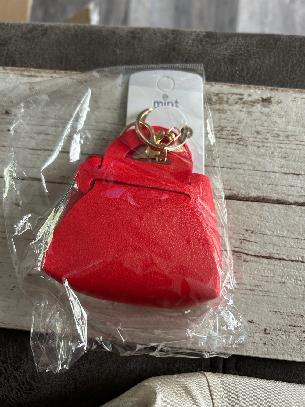 5/)25 Mint Red Mini Handbag Keyring with Gold Hardware